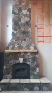 Faux stone fireplace panels in Chaska